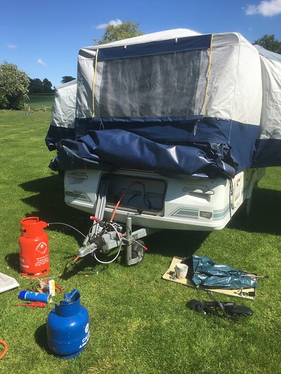 Folding camper van gas test as part of its annual service